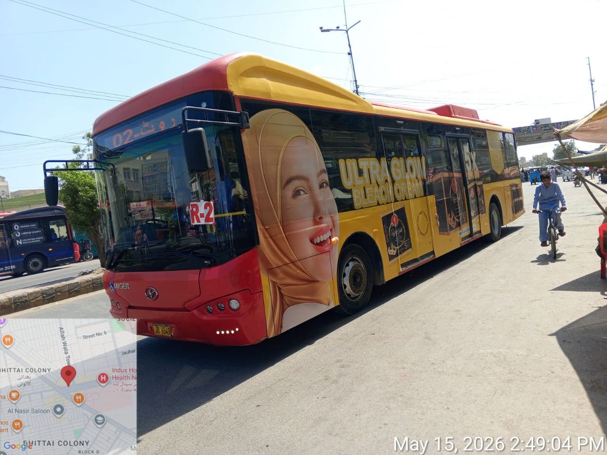 A fully-branded Speedo bus on a Karachi route